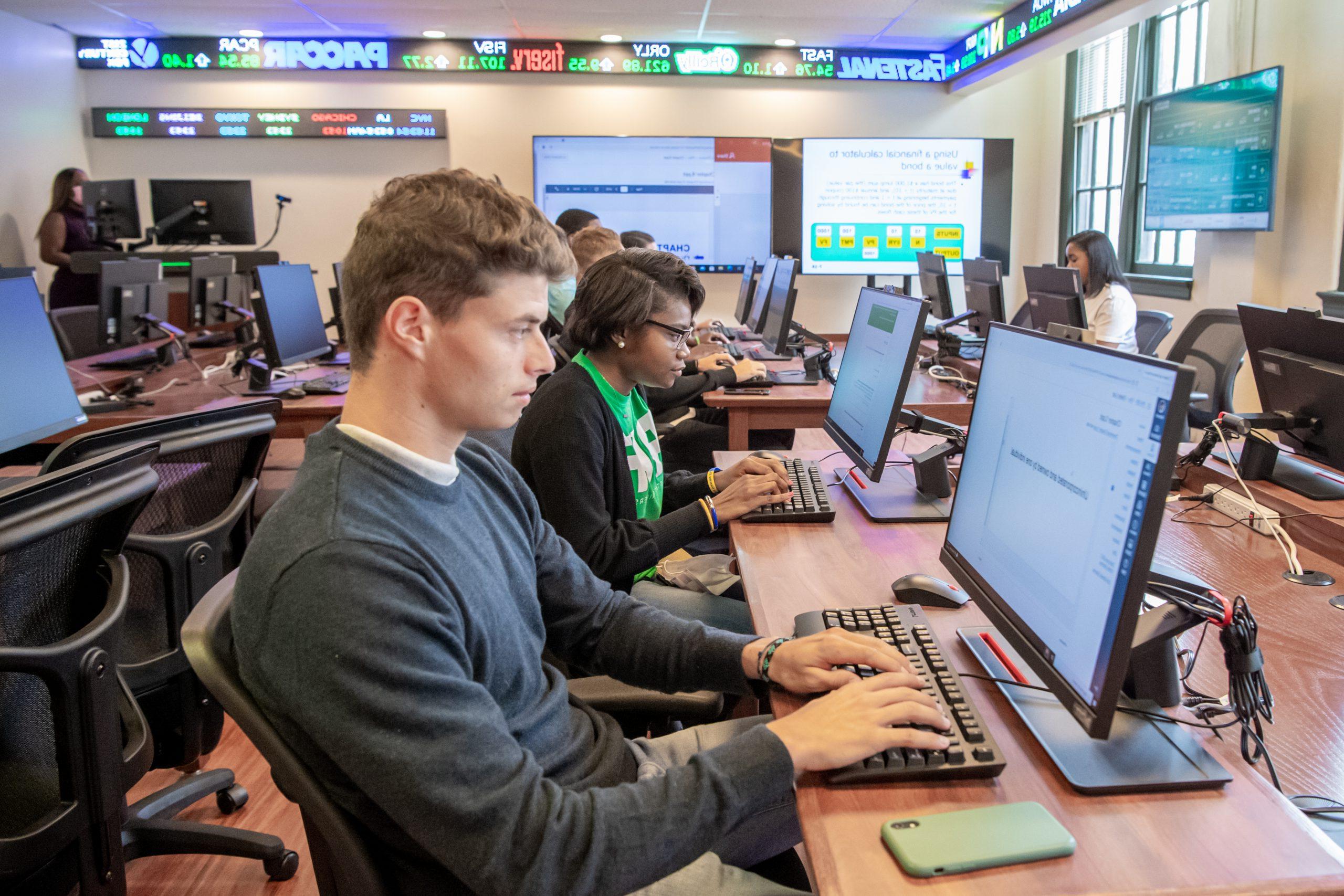 Students completing assignment during class time in the Finance lab.